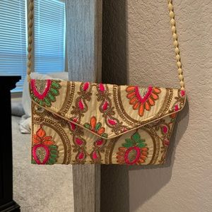 Beaded clutch with strap